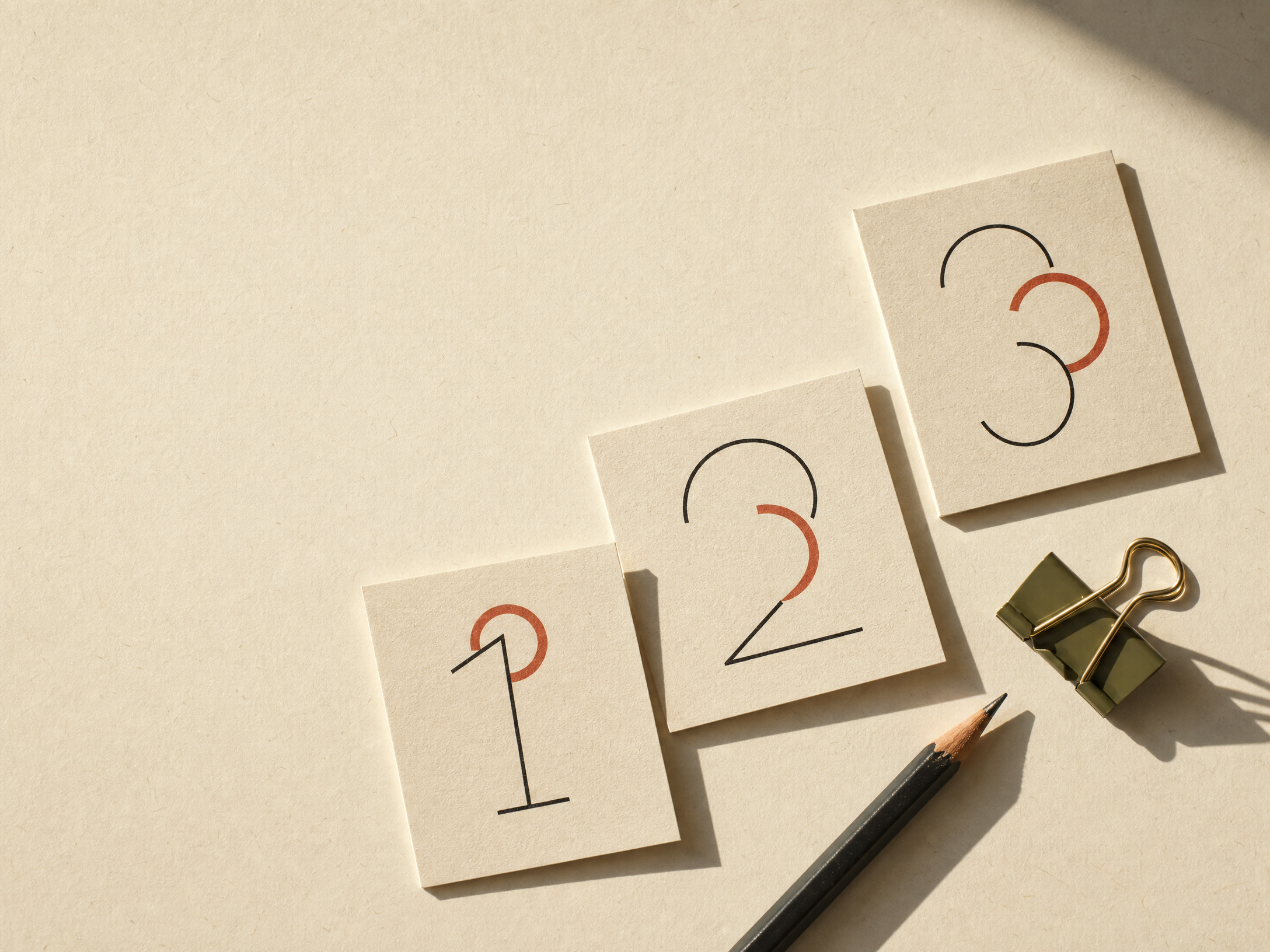 Three process cards with abstract step markers